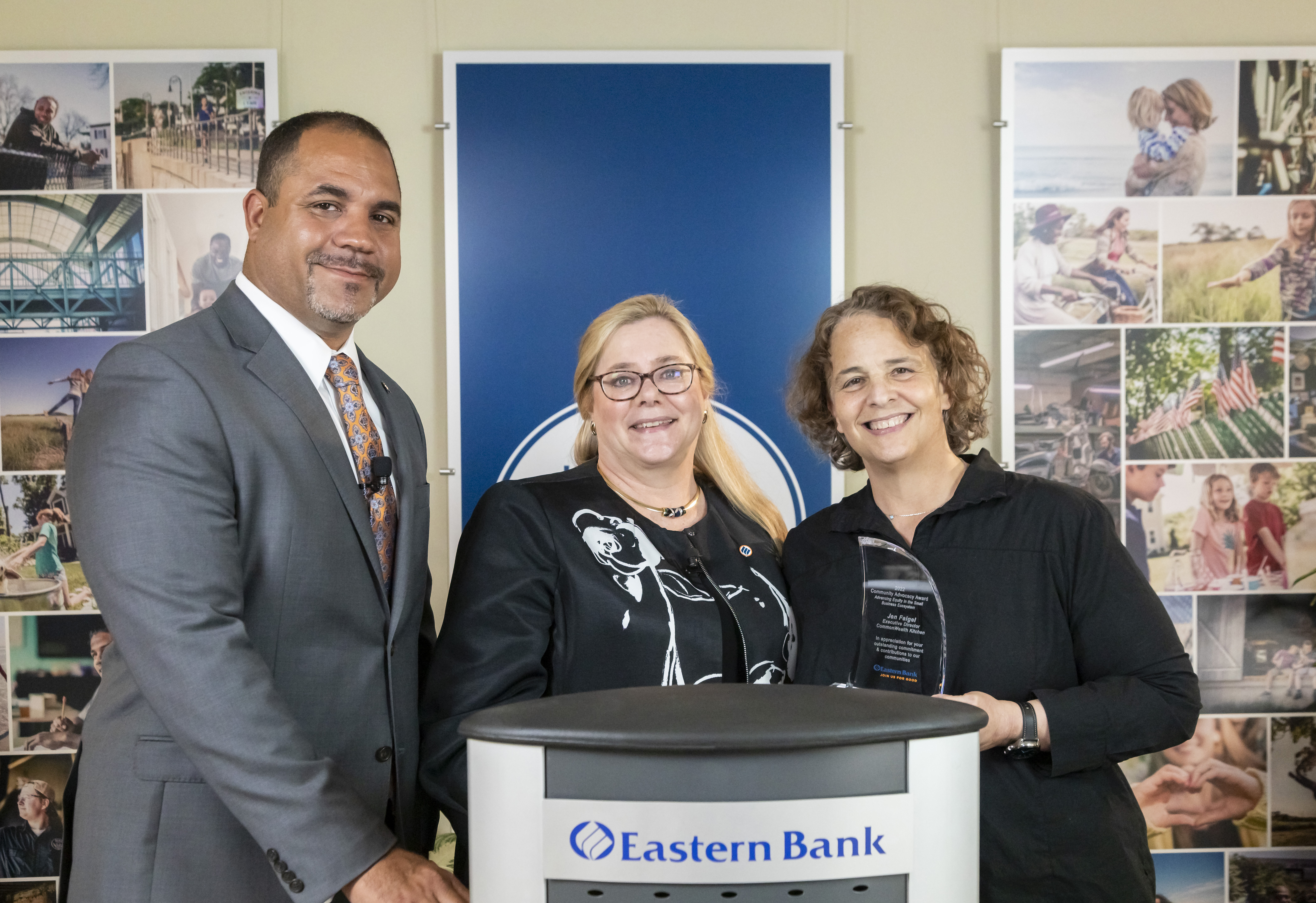 Eastern Bank president Quincy Miller and Eastern Bank Foundation president Cynthia Ciman stand with award winner CommonWealth Kitchen