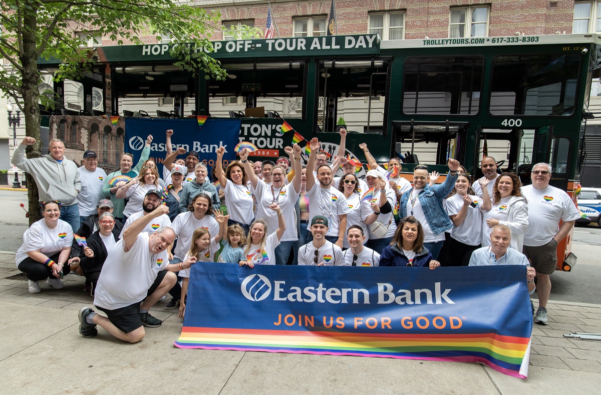 Eastern Bank employees gather for a celebratory picture at the Boston Pride Parade