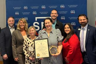 EmVision and its Eastern Bank Relationship Team celebrate EmVision’s recognition as a small business of the year