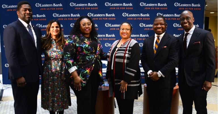 Shown left to right standing together and smiling at the camera are Jason Solomon, Sujata Yadav, Trillet Robinson, Dr. Noelle Trent, Reverend Willie Bodrick II and Michael Holley
