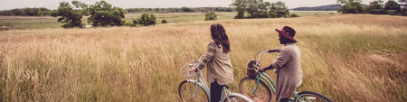 Riding Bicycles in Field
